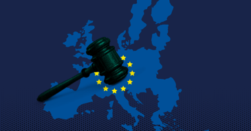A gavel over a map of Europe on a blue background.