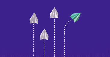 Four paper airplanes on a purple background.