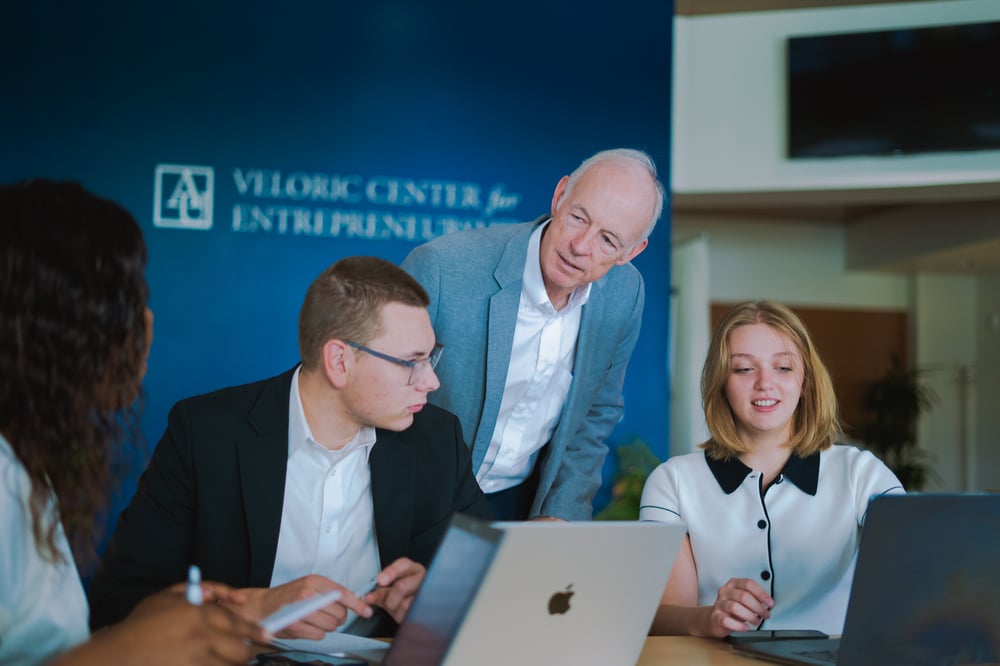 Tommy White with students in the Veloric Center Tommy White with students in the Veloric Center