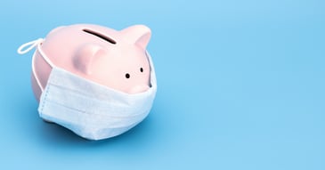 Piggy bank with mask on