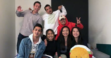 Rui Huang with a group of people