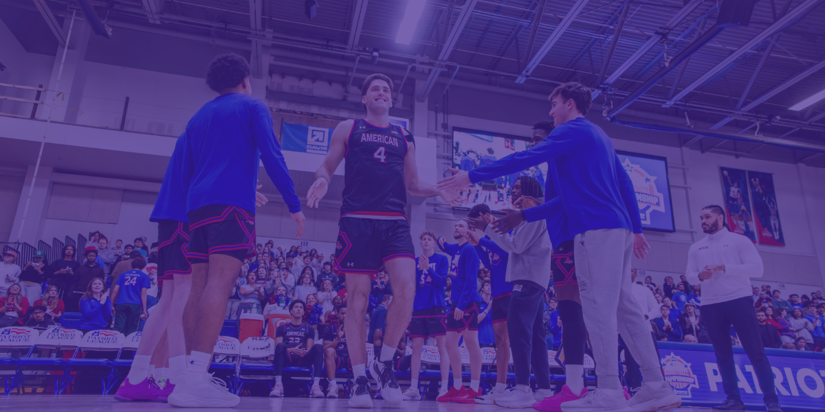 Lincoln Ball of the American University men's basketball team with teammates