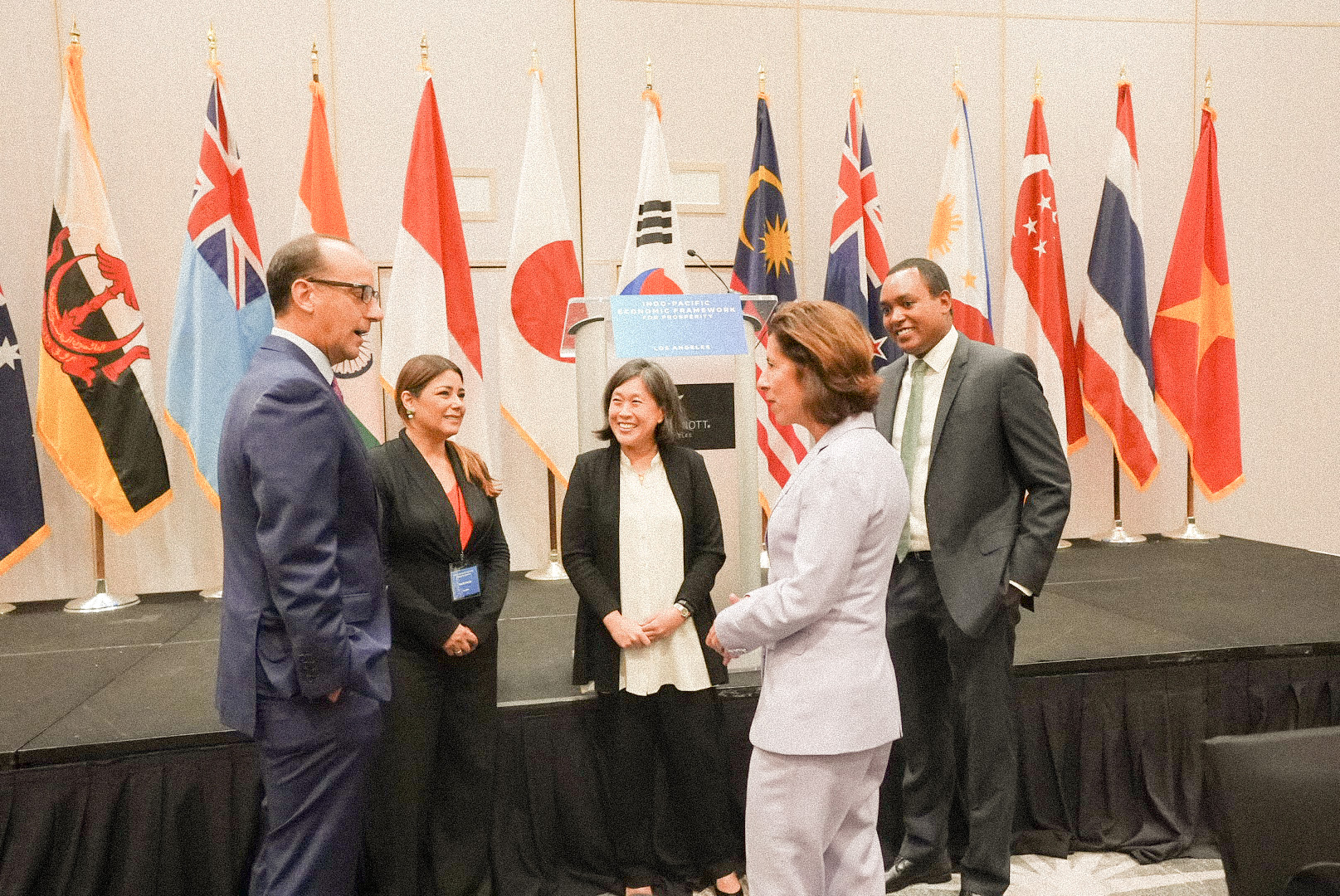 Dean Marchick (left), Ambassador Tai (center), and Secretary Raimondo (center, right)