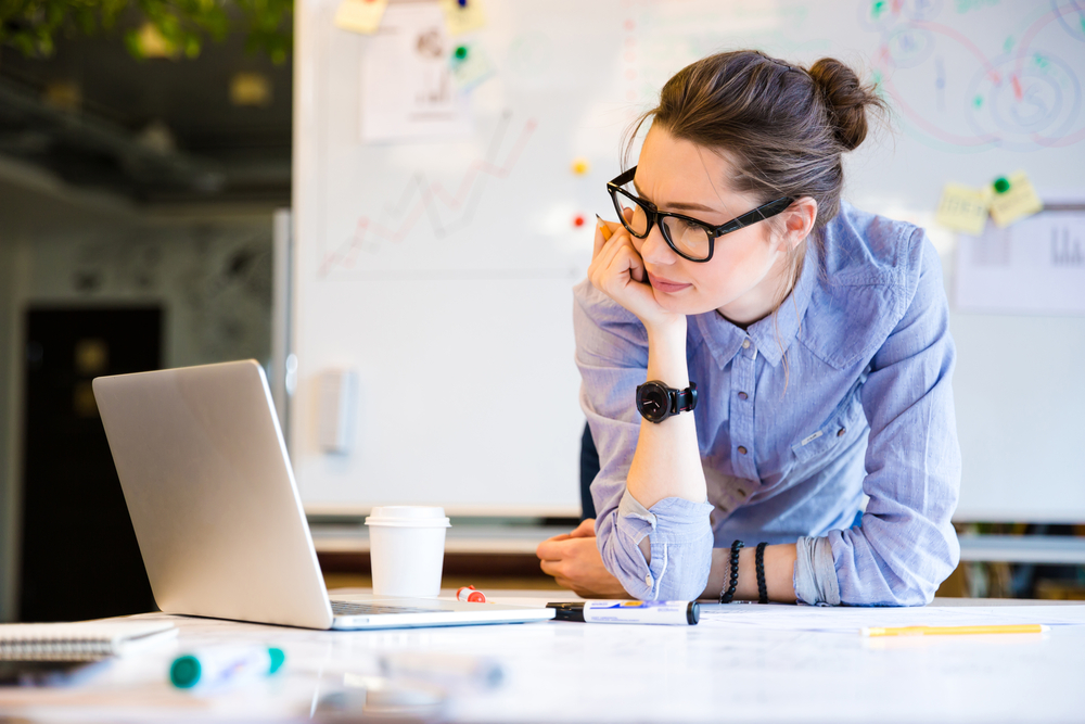 Young female businesswoman in the office