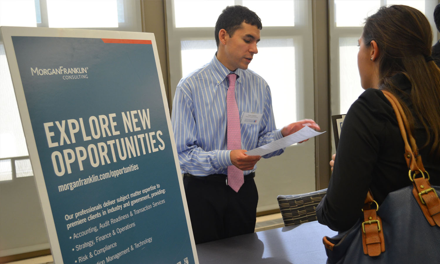 Recruiter talking to Kogod student